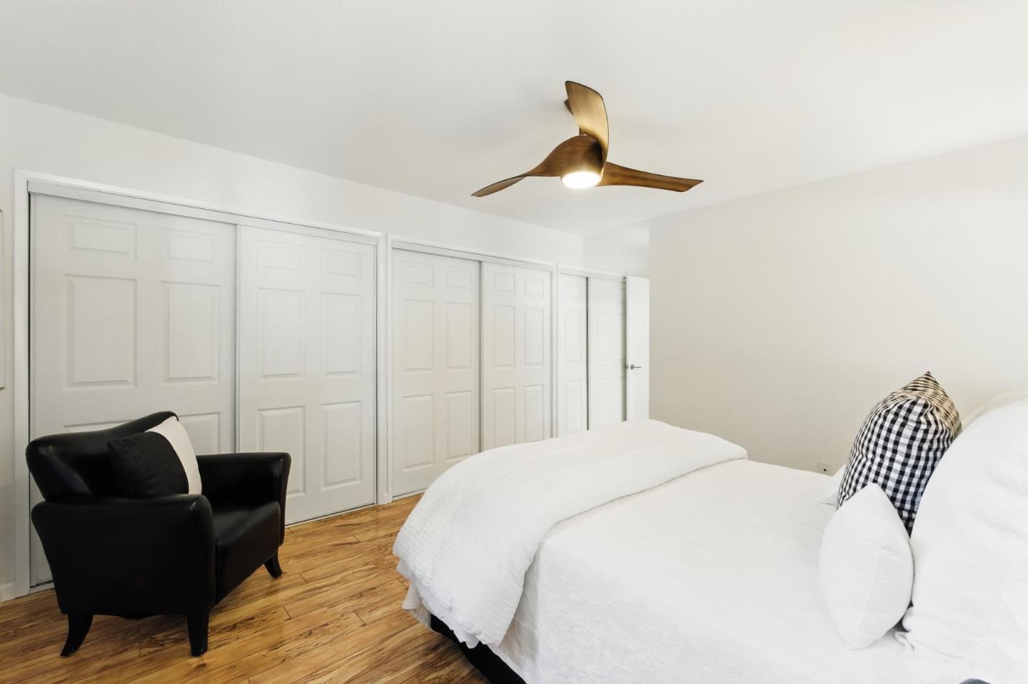 148 Promethean Way Mountain View, CA 94043 - Photo 20 of 45 a bedroom with a bed and chair