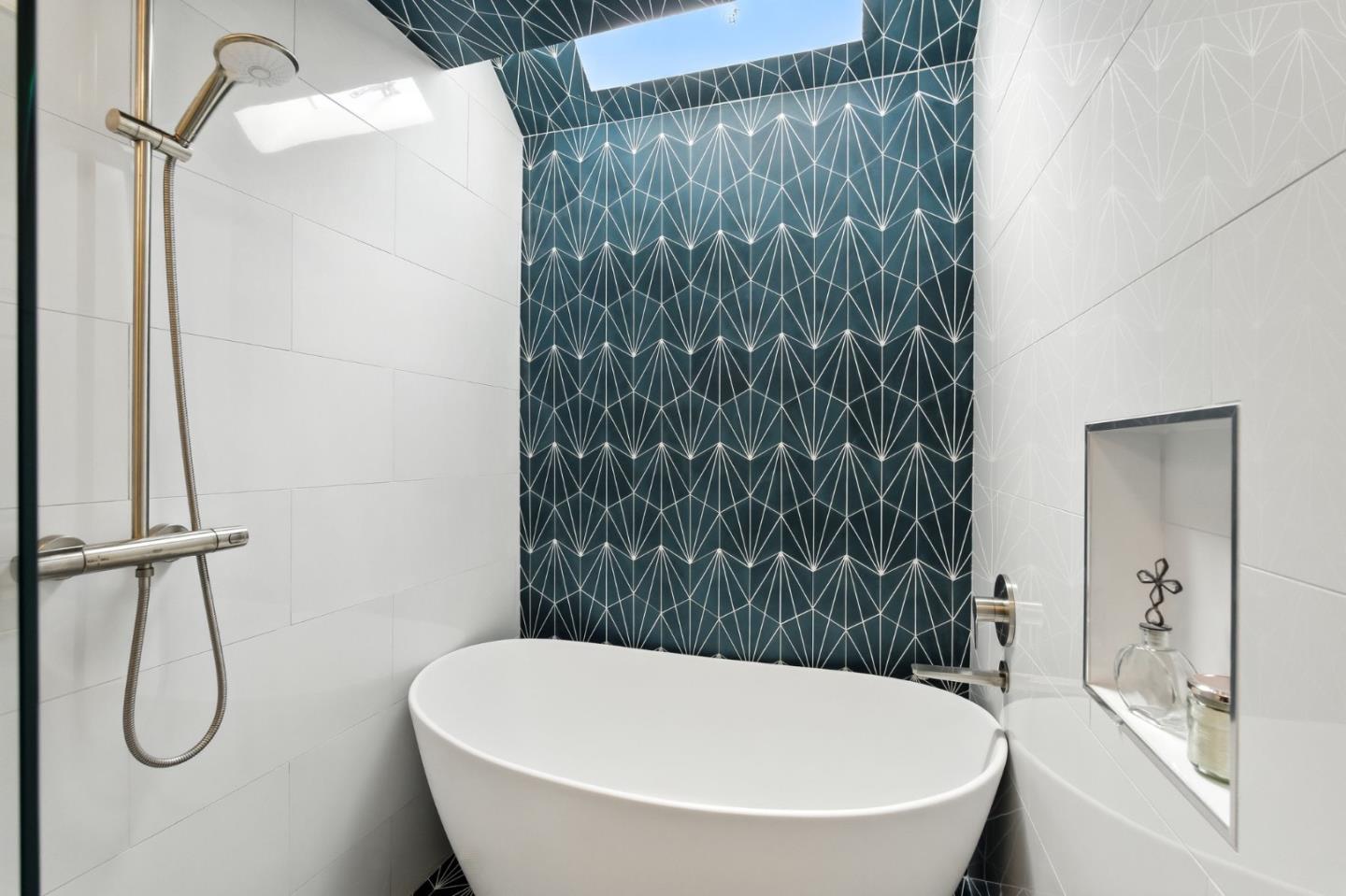 148 Promethean Way Mountain View, CA 94043 - Photo 22 of 45 a bathroom with a white bath tub and shower