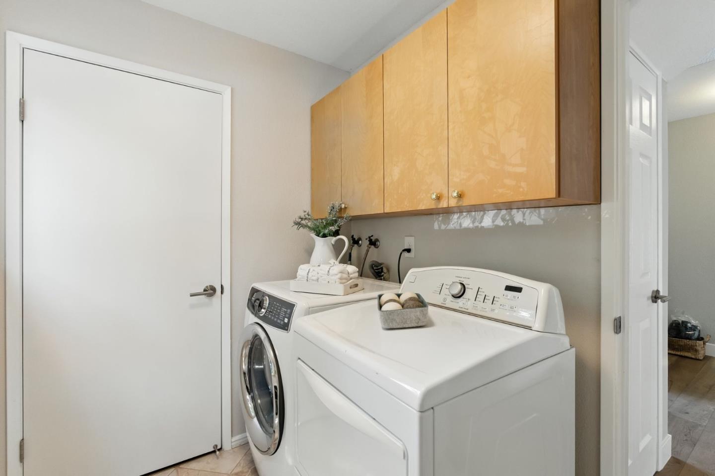148 Promethean Way Mountain View, CA 94043 - Photo 27 of 45 a utility room with dryer and washer