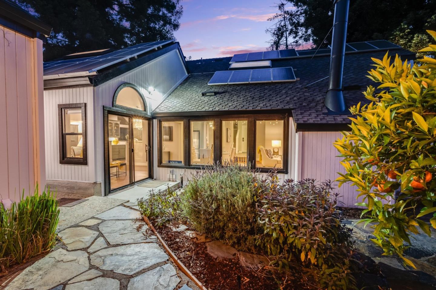 148 Promethean Way Mountain View, CA 94043 - Photo 3 of 45 a front view of a house with a yard