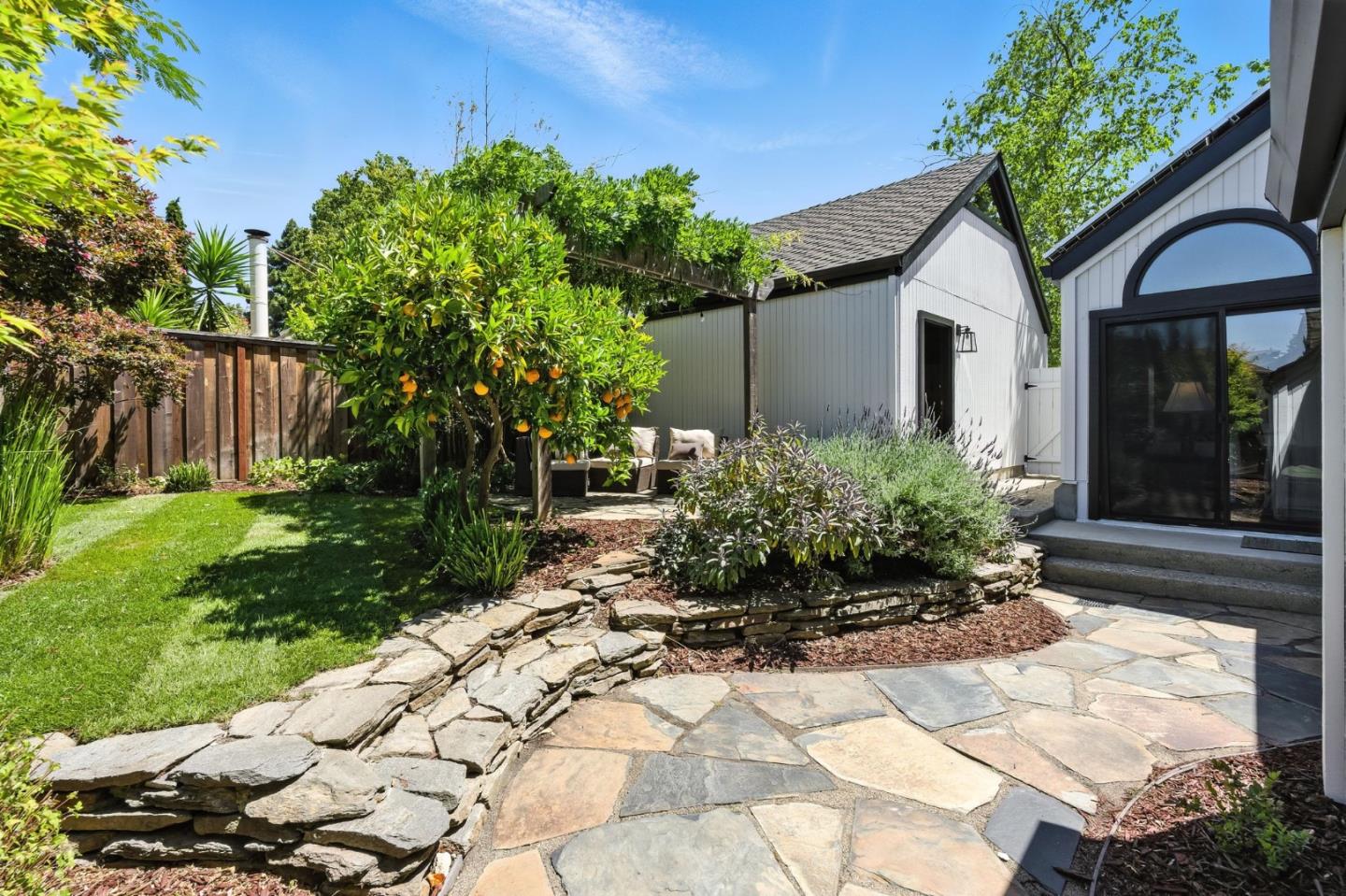 148 Promethean Way Mountain View, CA 94043 - Photo 34 of 45 a front view of a house with a yard
