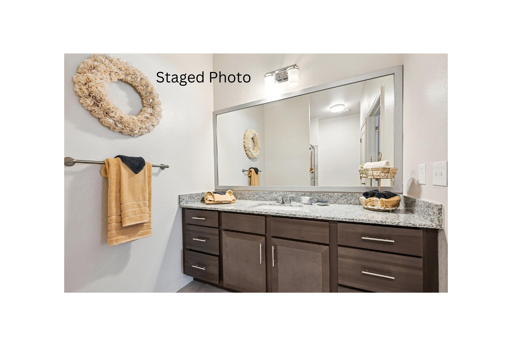 1900 Northwest Federal Highway Stuart, FL 34994 - Photo 7 of 15 a bathroom with a sink a mirror and a vanity