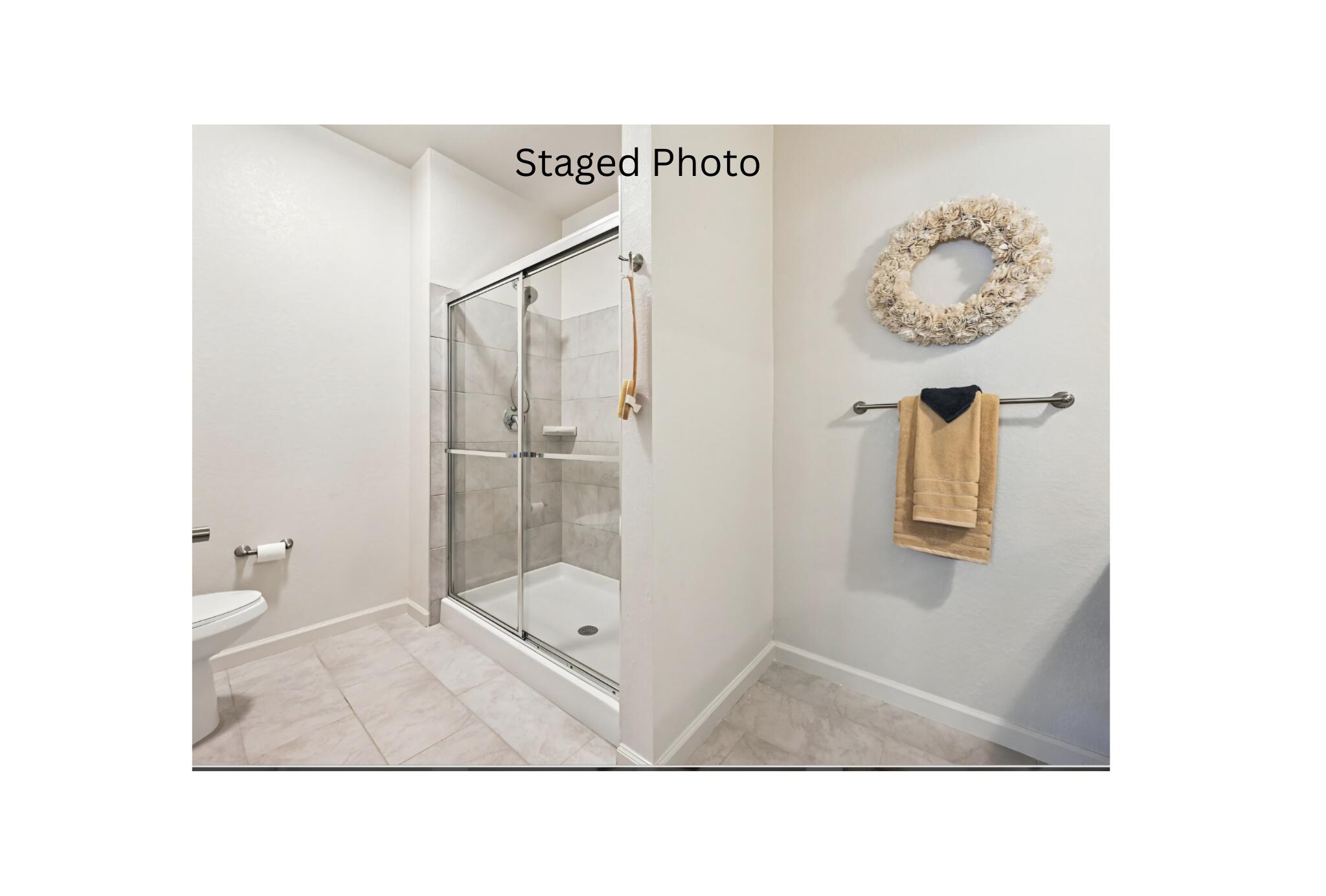 1900 Northwest Federal Highway Stuart, FL 34994 - Photo 8 of 15 a bathroom with a toilet and a shower