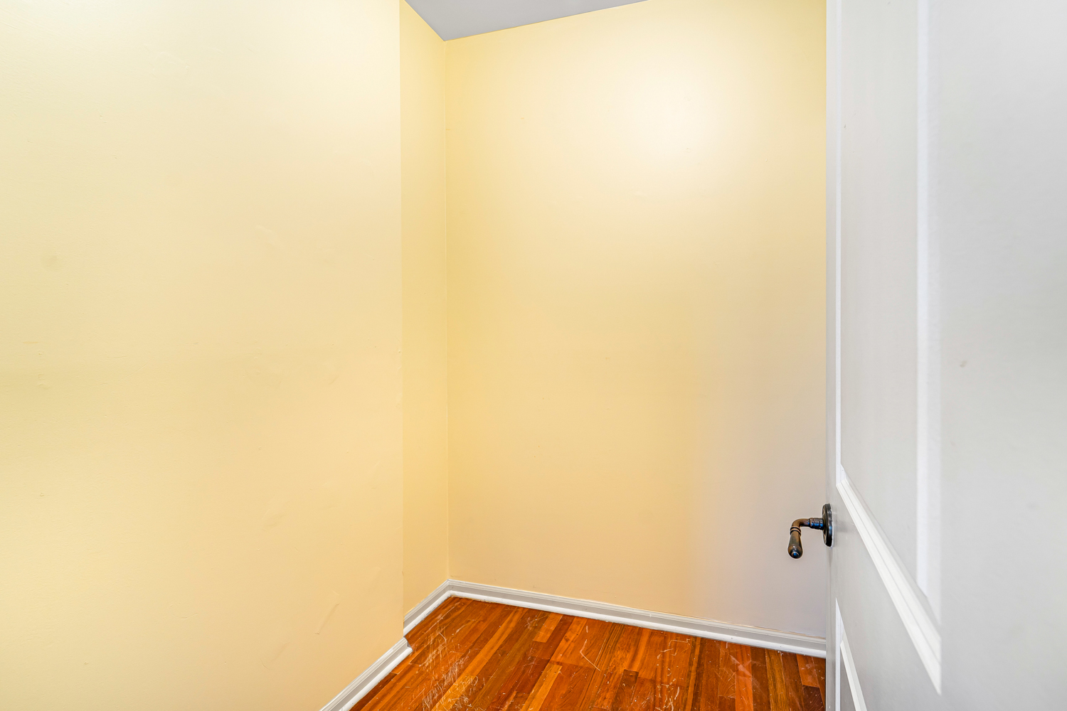 1018 South May Street, Unit F Chicago, IL 60607 - Photo 14 of 21 a view of a room with wooden floor and a window