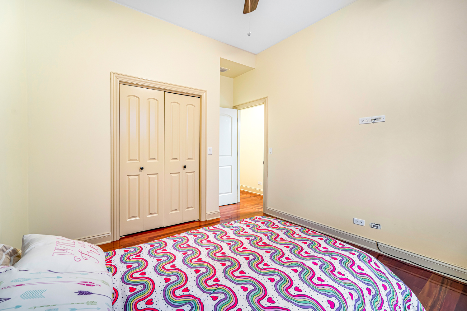1018 South May Street, Unit F Chicago, IL 60607 - Photo 16 of 21 a bedroom with a bed and a window