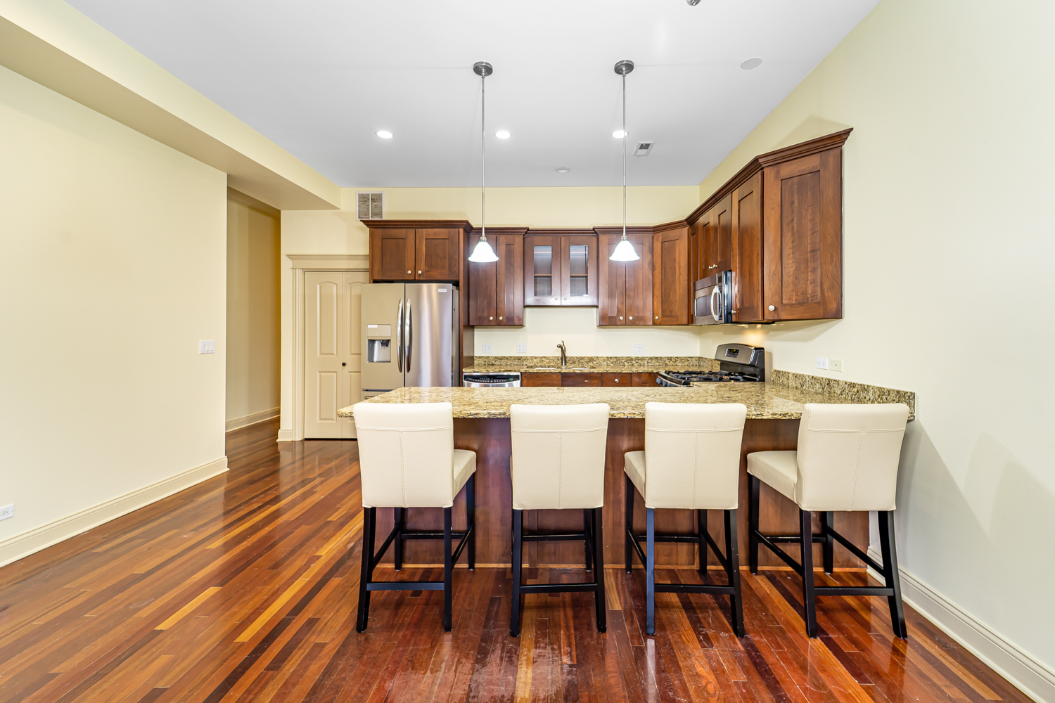 1018 South May Street, Unit F Chicago, IL 60607 - Photo 3 of 21 a view of kitchen with breakfast area