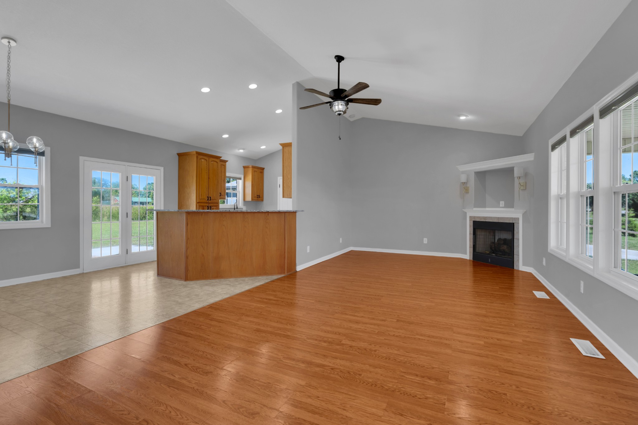 3896 Lynchburg Road Winchester, TN 37398 - Photo 9 of 57 a view of empty room with wooden floor and a fireplace