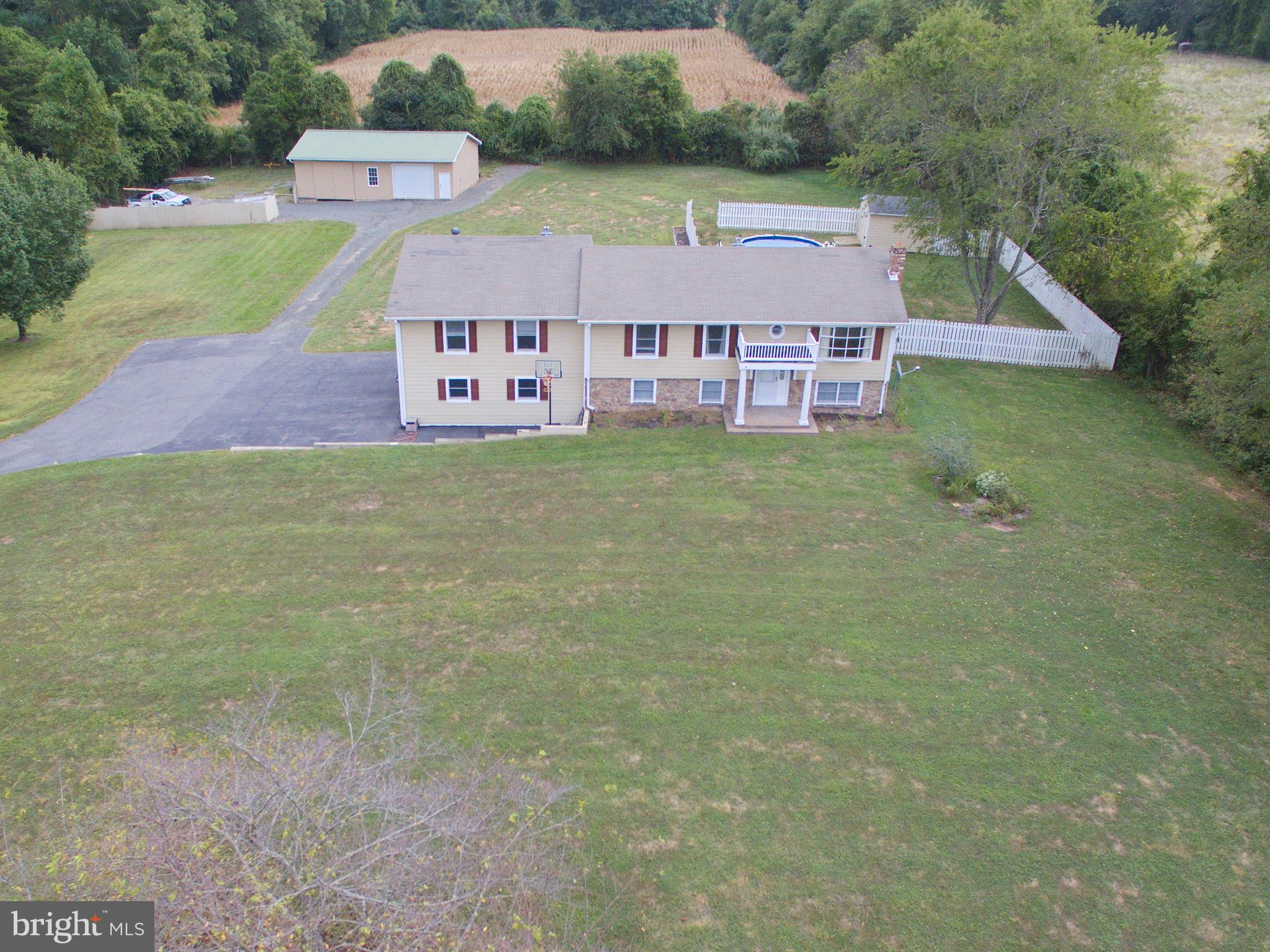 Mostly fenced 2 acre level, private lot
