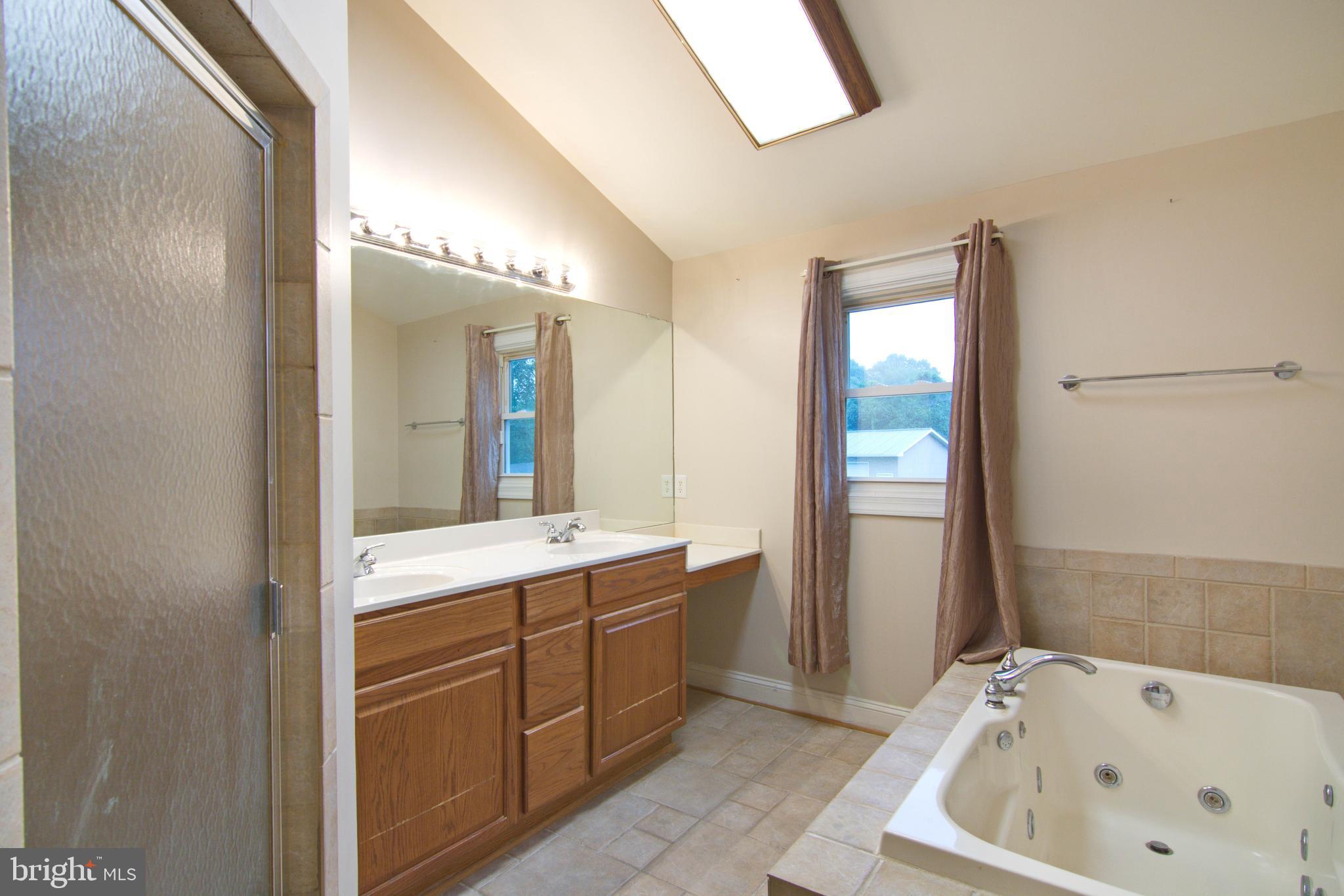 9645 Clarkes Road Bealeton, VA 22712 - Photo 9 of 32 Master bath with separate tub and shower