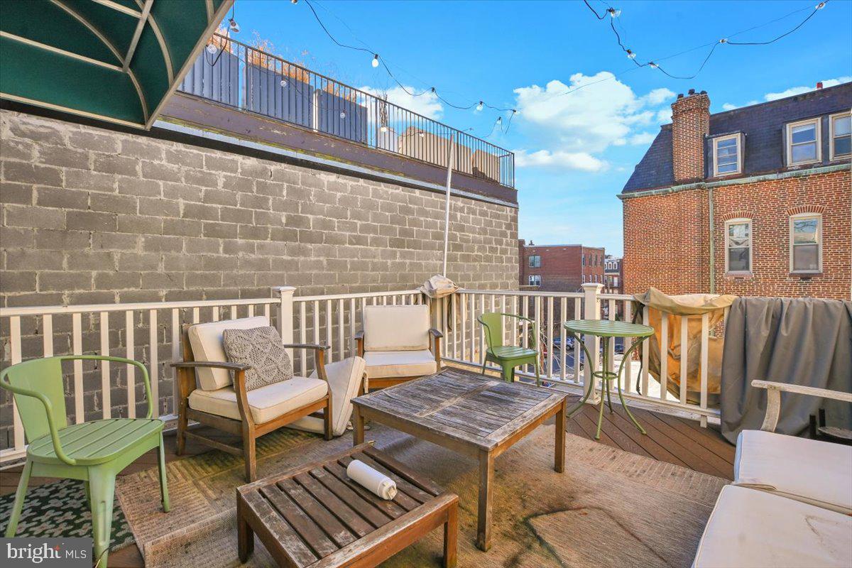 1614 15th Street Northwest Washington, DC 20009 - Photo 18 of 47 a balcony view with a seating space