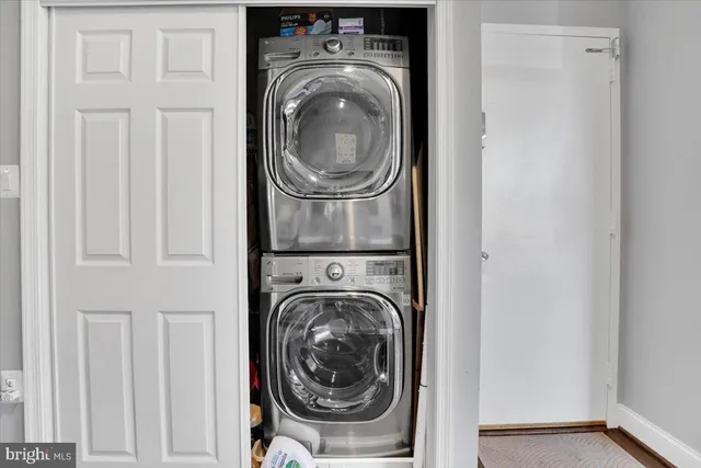 a bathroom with a shower and a sink