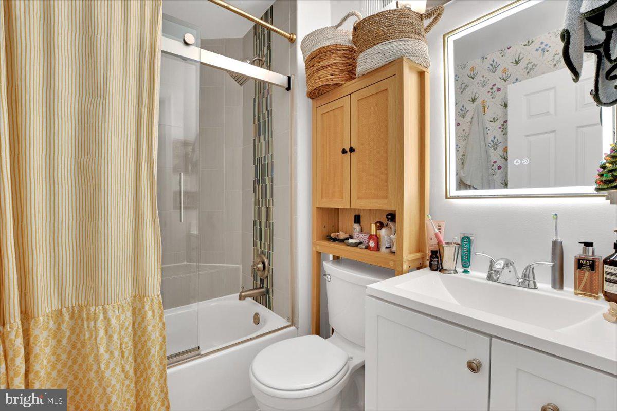 1614 15th Street Northwest Washington, DC 20009 - Photo 40 of 47 a bathroom with a sink toilet and shower