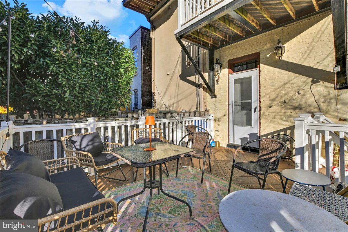 1614 15th Street Northwest Washington, DC 20009 - Photo 42 of 47 a balcony with table and chairs