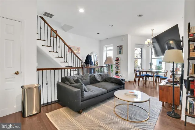 a kitchen with stainless steel appliances granite countertop a refrigerator stove a sink dishwasher and microwave with cabinets