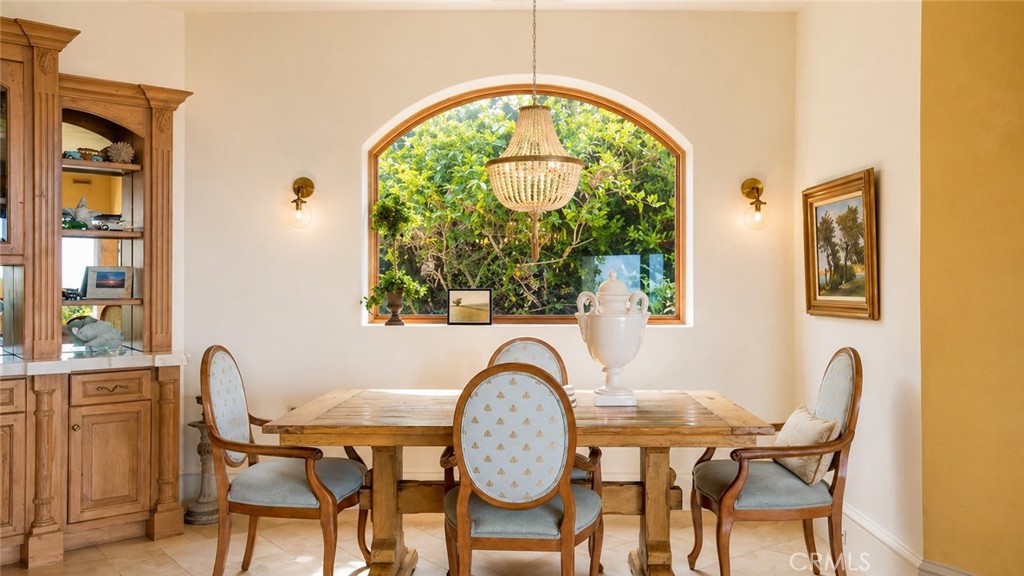 26 Ritz Cove Drive Dana Point, CA 92629 - Photo 17 of 66 a view of a dining area with furniture and a window