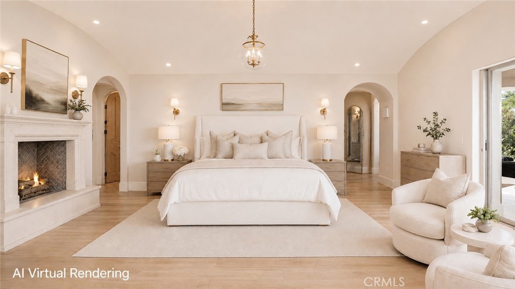 26 Ritz Cove Drive Dana Point, CA 92629 - Photo 45 of 66 a spacious bedroom with a bed and a fireplace