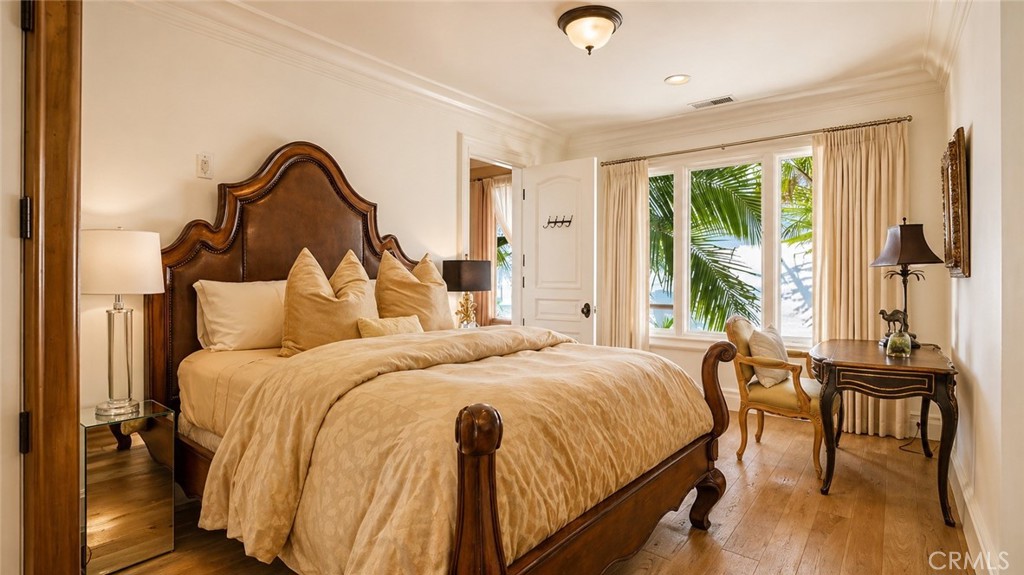 26 Ritz Cove Drive Dana Point, CA 92629 - Photo 52 of 66 a bedroom with a bed and a table