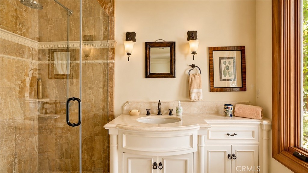 26 Ritz Cove Drive Dana Point, CA 92629 - Photo 53 of 66 a bathroom with a double vanity sink mirror and