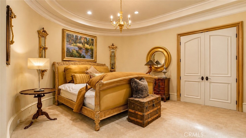26 Ritz Cove Drive Dana Point, CA 92629 - Photo 54 of 66 a bedroom with a bed and a dresser with mirror