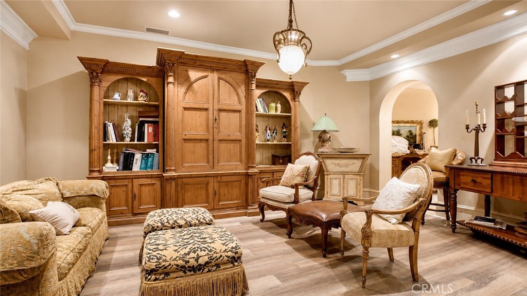 26 Ritz Cove Drive Dana Point, CA 92629 - Photo 57 of 66 a living room with furniture chandelier and a rug