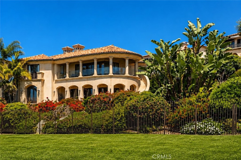 26 Ritz Cove Drive Dana Point, CA 92629 - Photo 63 of 66 a front view of a house with a garden