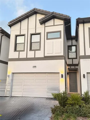 a living room with a couch and a flat screen tv