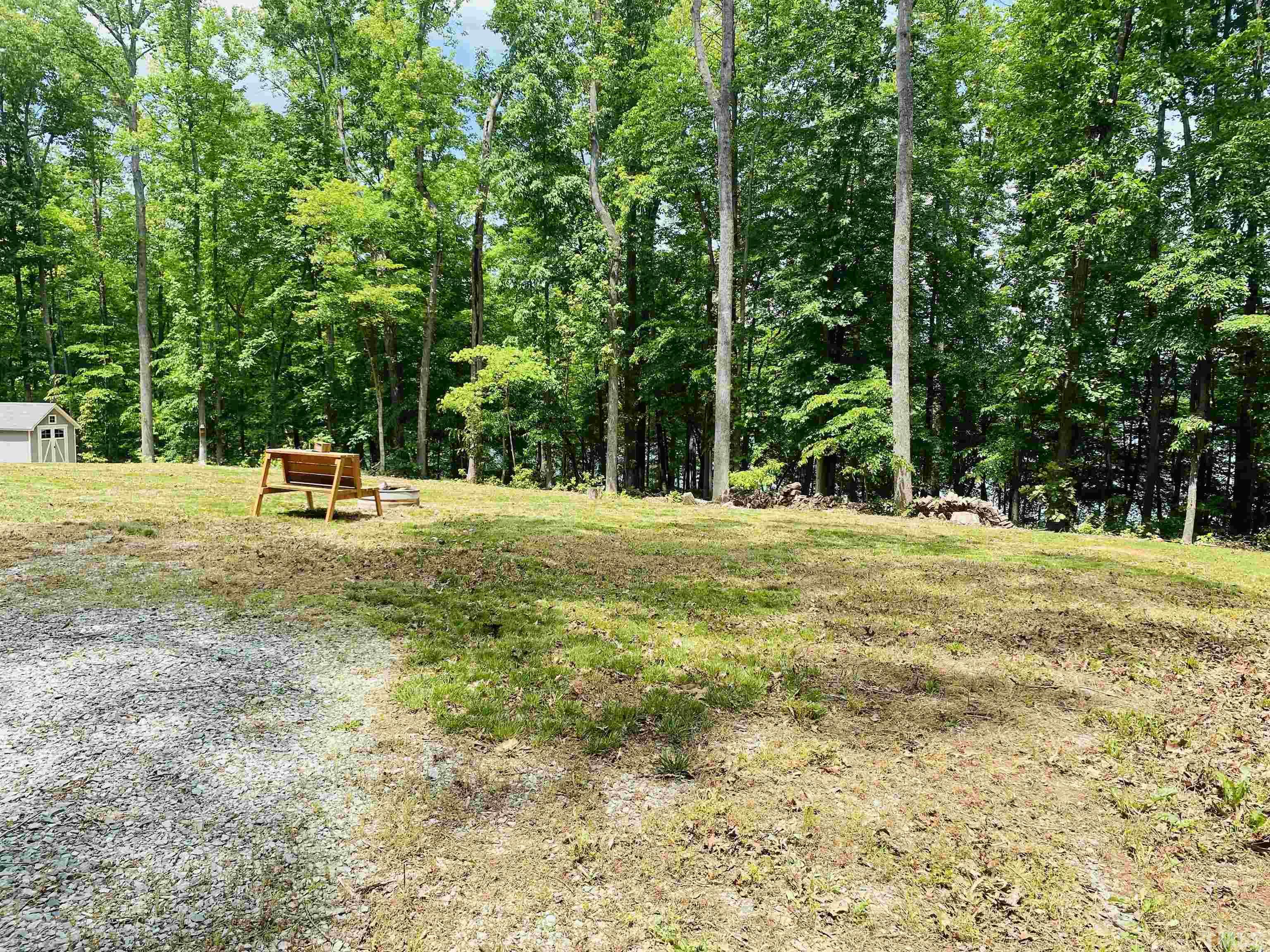 634 Fishermans Point Road Roxboro, NC 27574 - Photo 3 of 20 a childrens park with lots of trees
