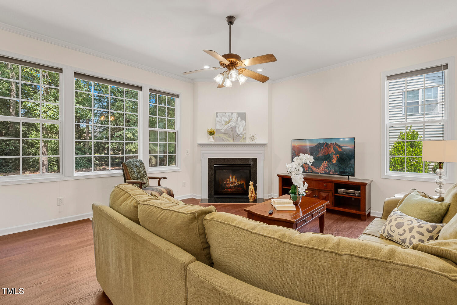 2013 Prairie Ridge Court Fuquay-Varina, NC 27526 - Photo 14 of 53 a living room with furniture and a fireplace