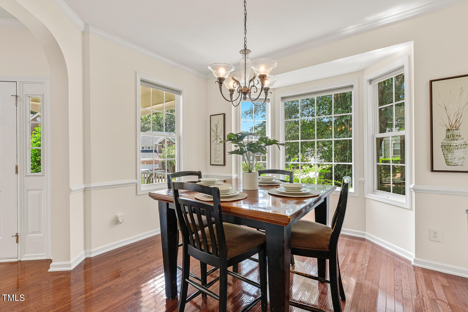 2013 Prairie Ridge Court Fuquay-Varina, NC 27526 - Photo 17 of 53 a view of a dining room with furniture window and wooden floor
