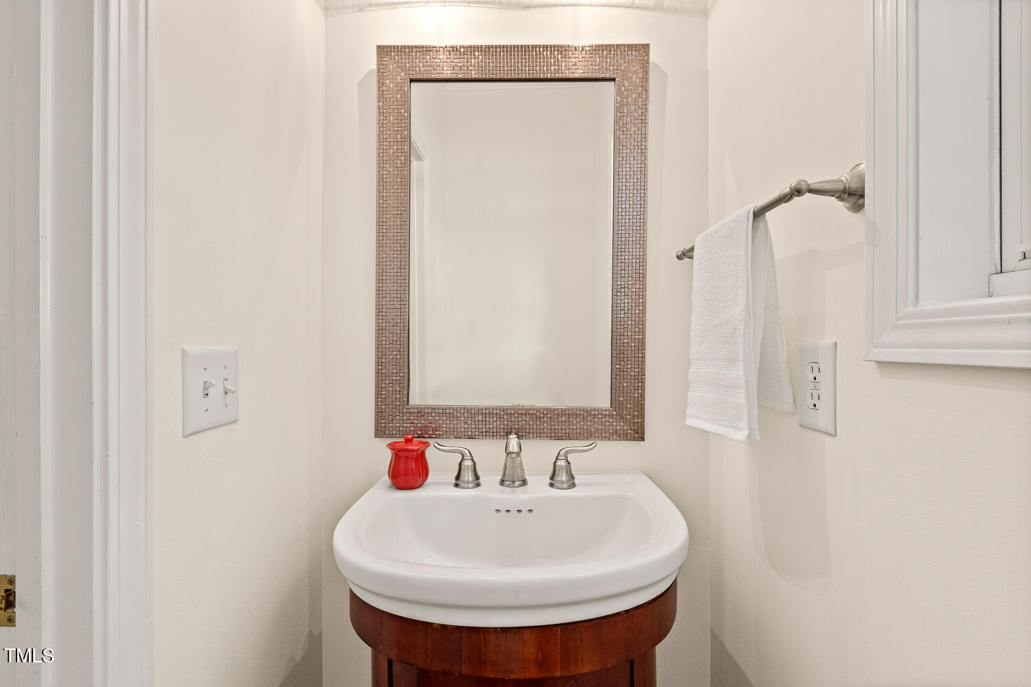 2013 Prairie Ridge Court Fuquay-Varina, NC 27526 - Photo 23 of 53 a bathroom with a sink and a mirror