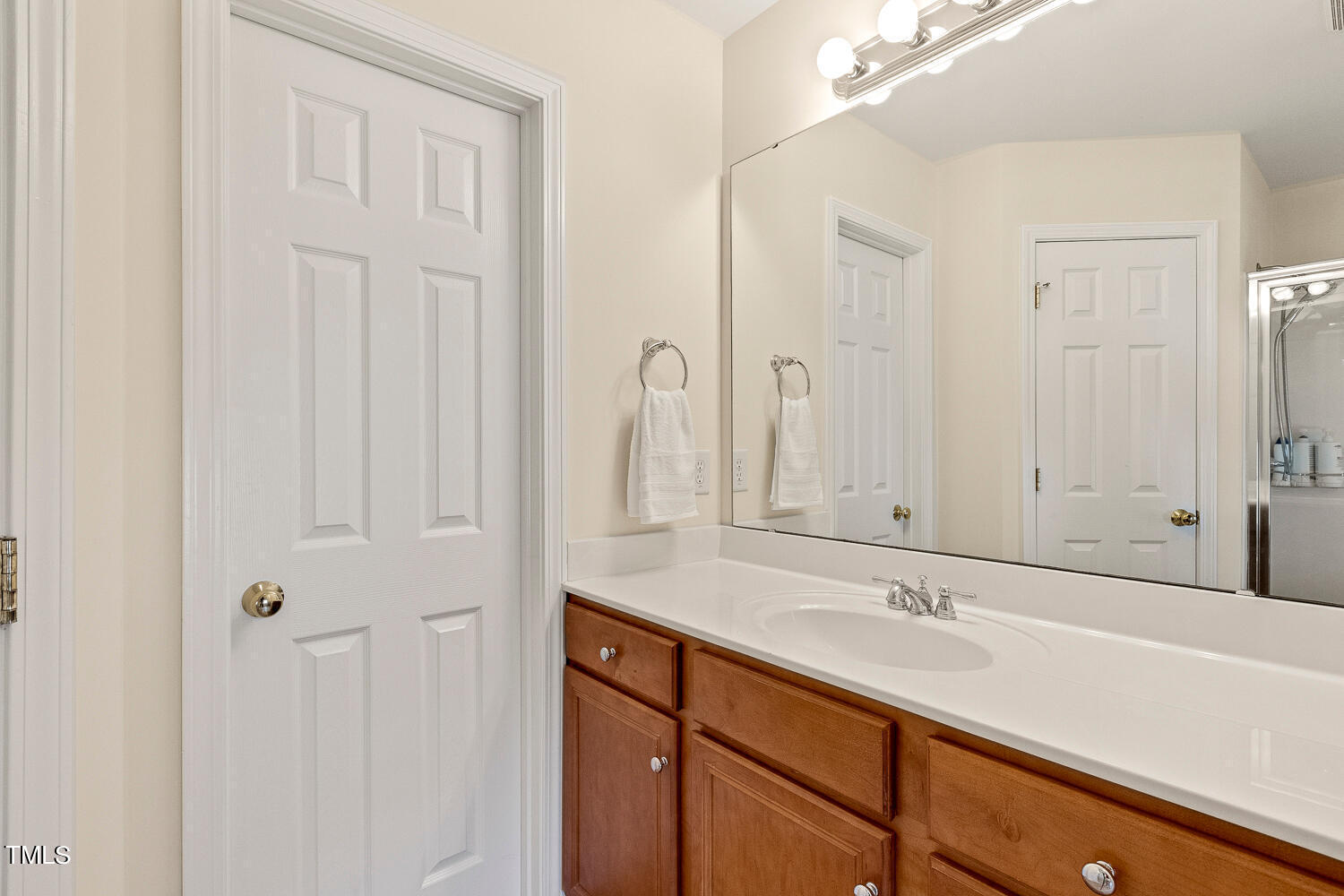2013 Prairie Ridge Court Fuquay-Varina, NC 27526 - Photo 29 of 53 a bathroom with a sink and a mirror