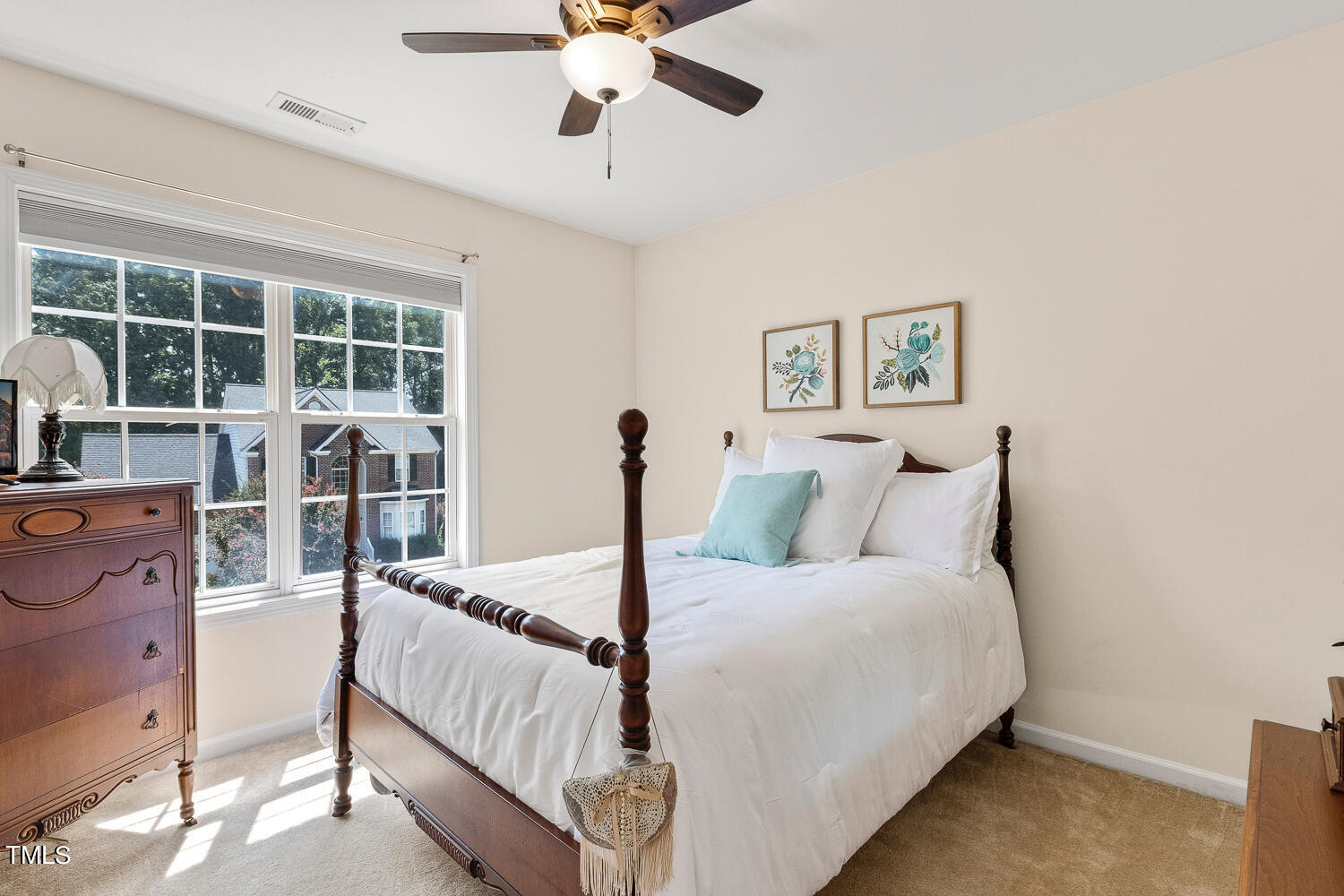 2013 Prairie Ridge Court Fuquay-Varina, NC 27526 - Photo 32 of 53 a bed room with a bed and a large window