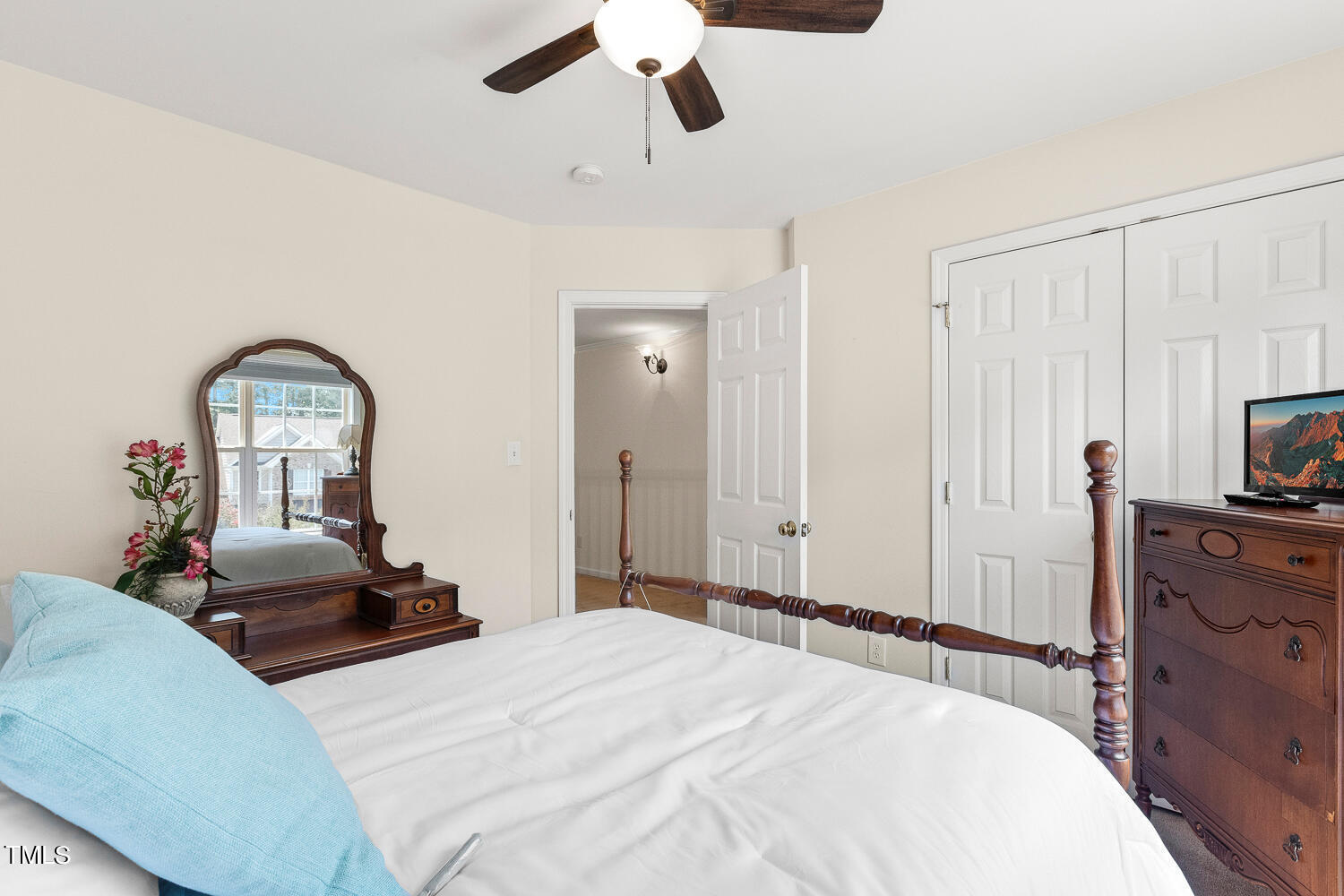 2013 Prairie Ridge Court Fuquay-Varina, NC 27526 - Photo 33 of 53 a bedroom with a bed and a dresser