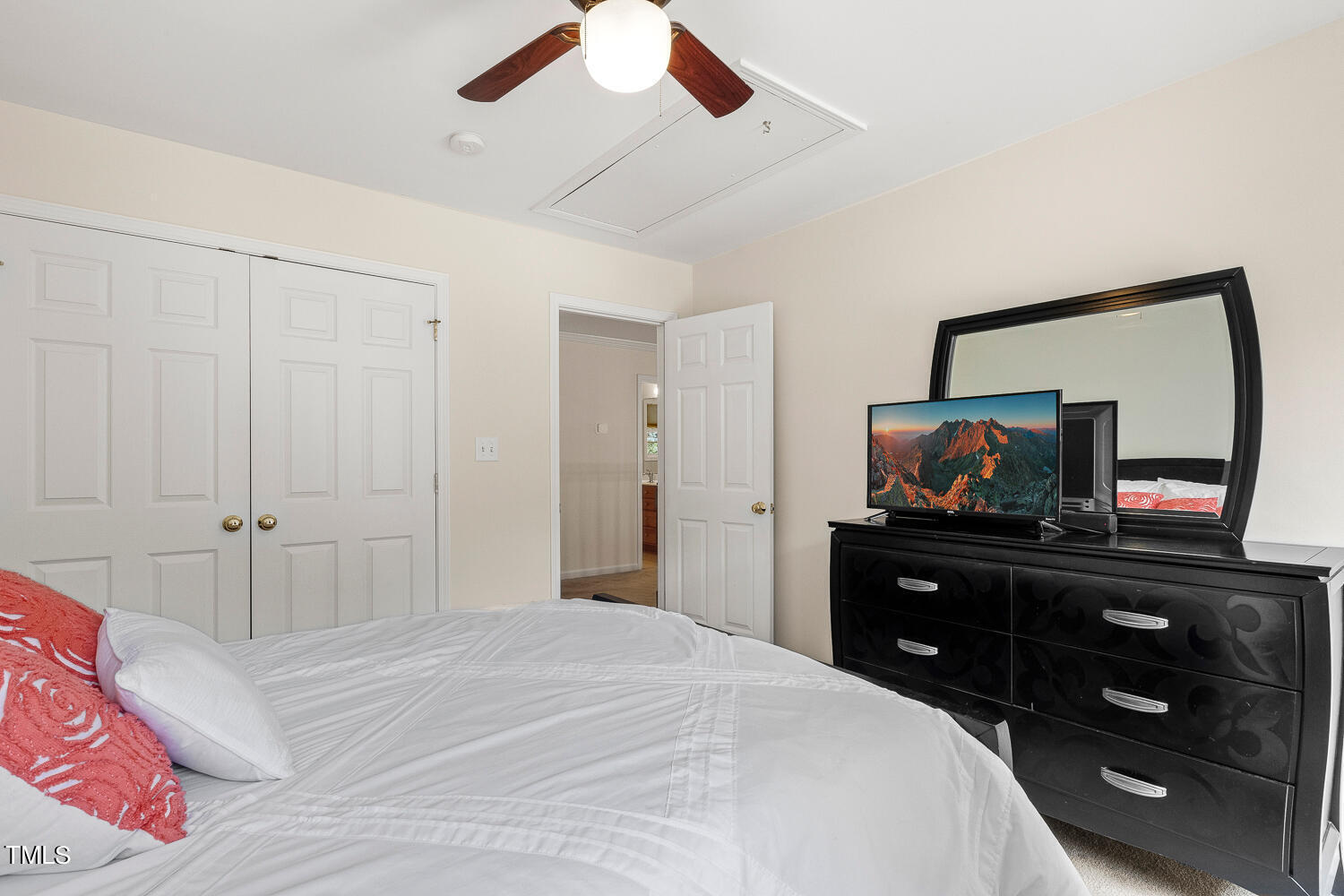 2013 Prairie Ridge Court Fuquay-Varina, NC 27526 - Photo 35 of 53 a bedroom with a bed and a television on dresser