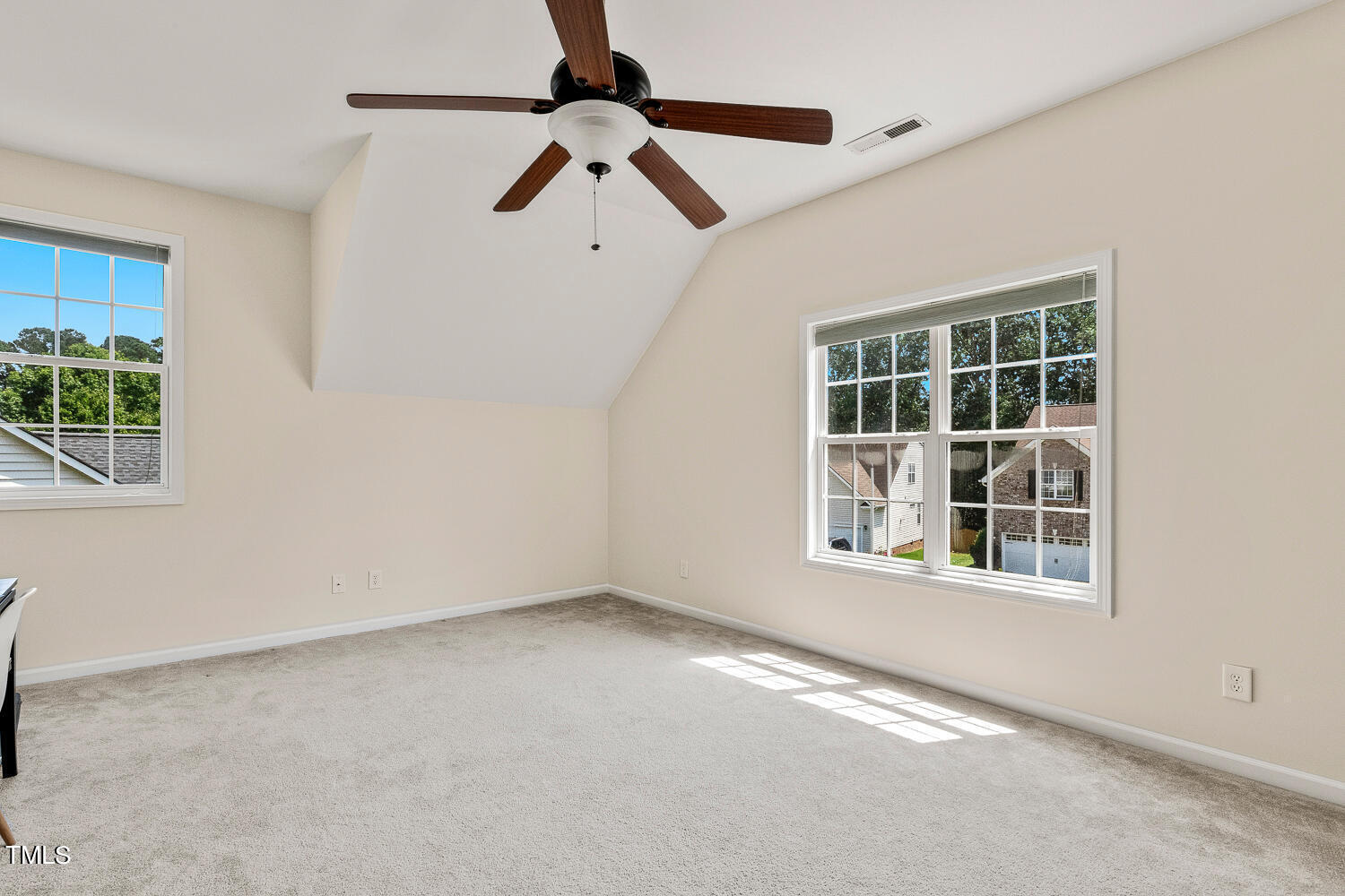 2013 Prairie Ridge Court Fuquay-Varina, NC 27526 - Photo 39 of 53 a view of an empty room with a window