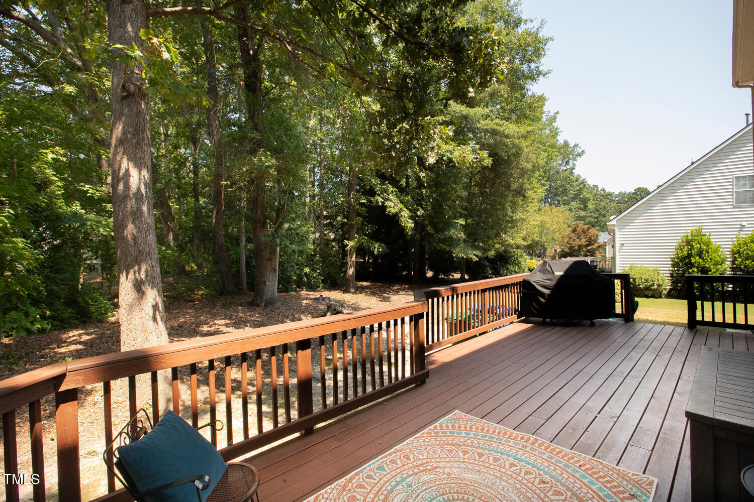 2013 Prairie Ridge Court Fuquay-Varina, NC 27526 - Photo 43 of 53 a view of a balcony with couches and wooden floor