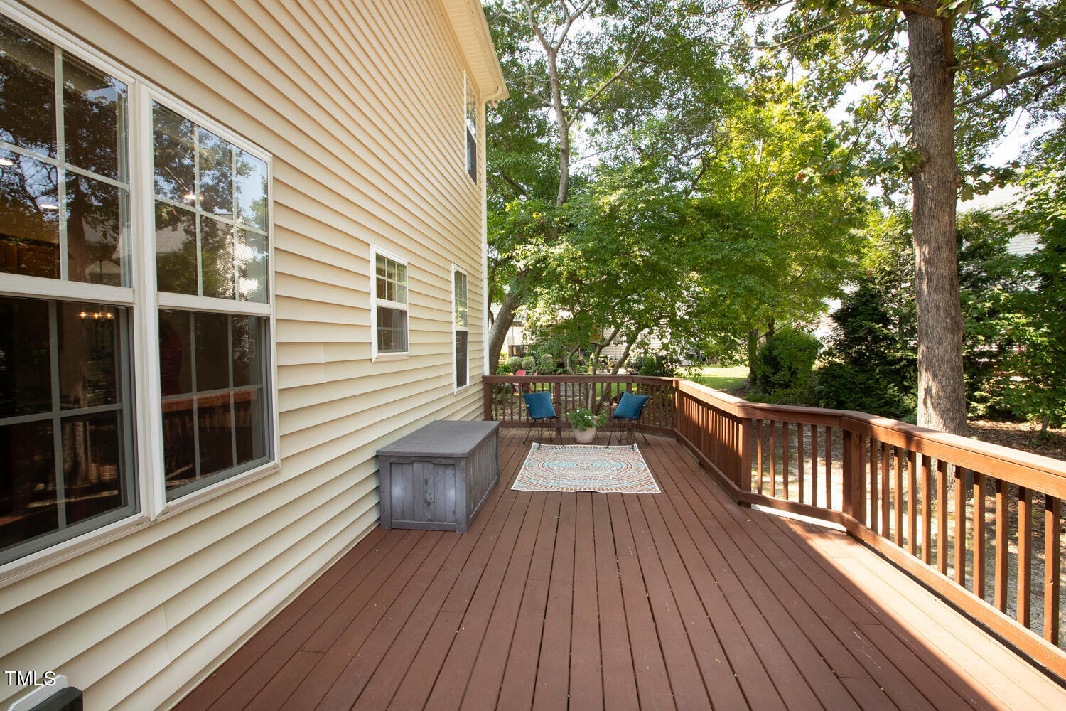 2013 Prairie Ridge Court Fuquay-Varina, NC 27526 - Photo 44 of 53 a view of a balcony with wooden floor and fence
