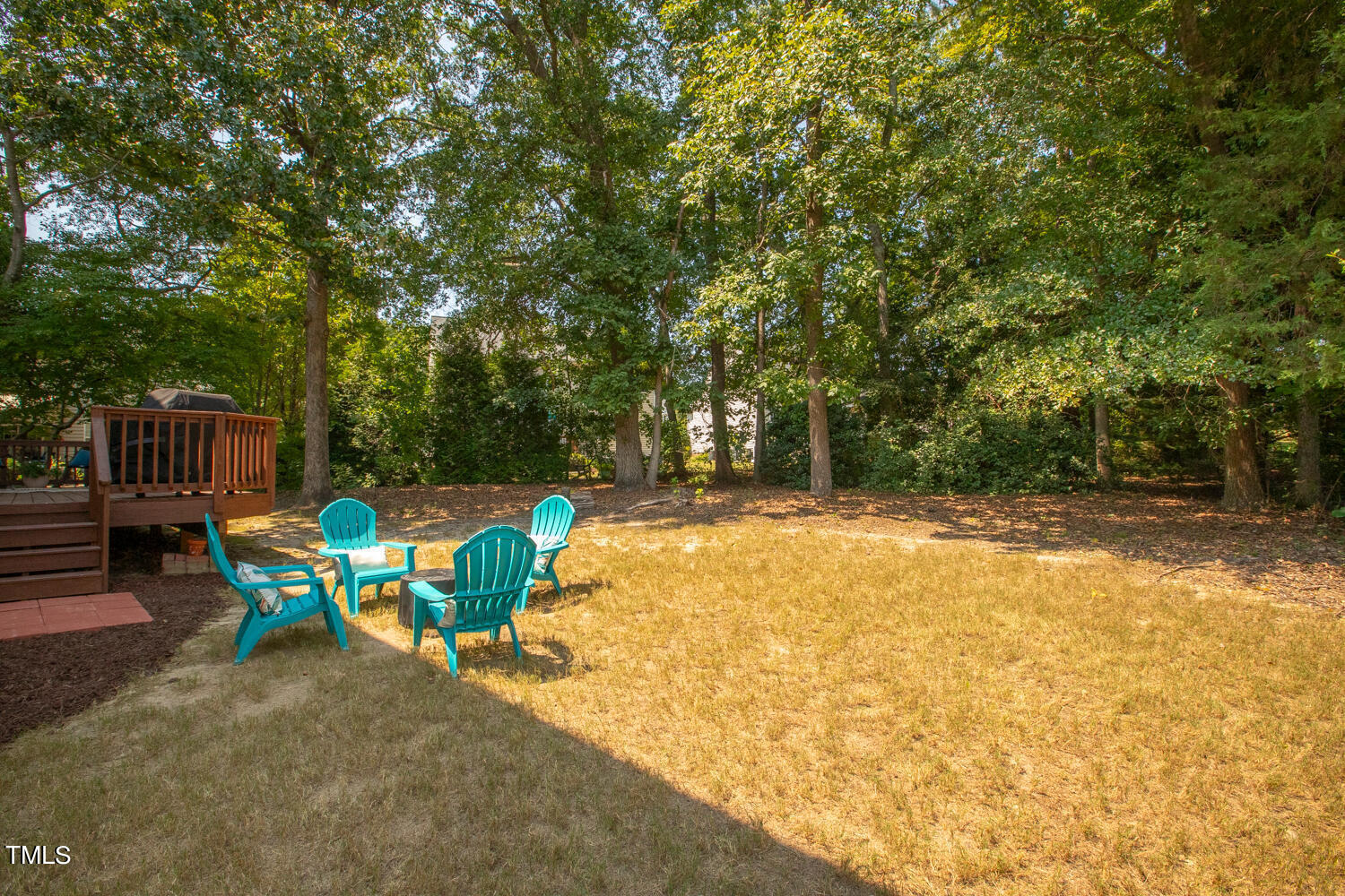 2013 Prairie Ridge Court Fuquay-Varina, NC 27526 - Photo 45 of 53 a view of backyard with swimming pool and seating