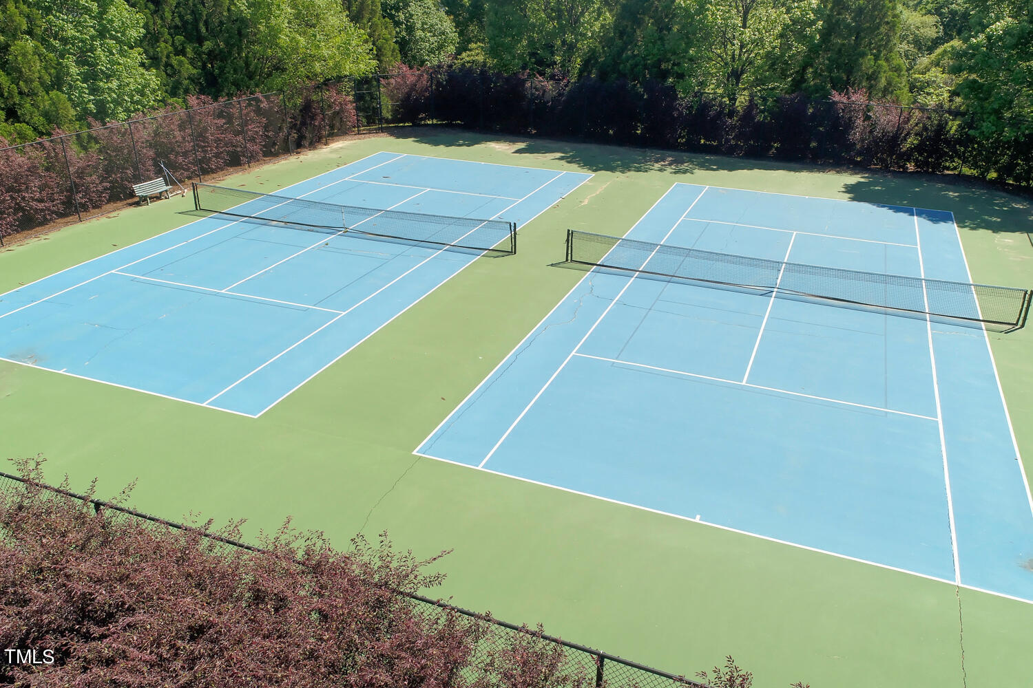2013 Prairie Ridge Court Fuquay-Varina, NC 27526 - Photo 51 of 53 a view of an outdoor space and tennis court