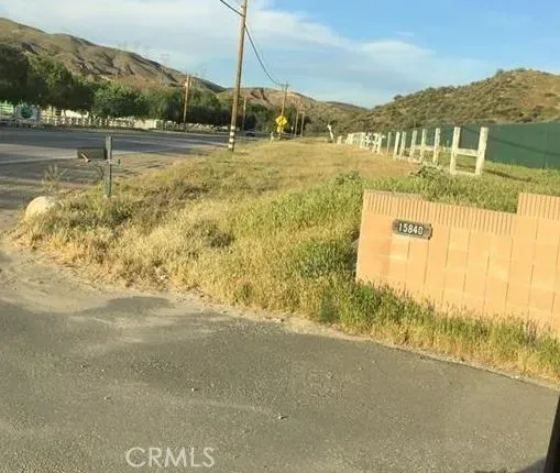 a view of an ocean with a mountain