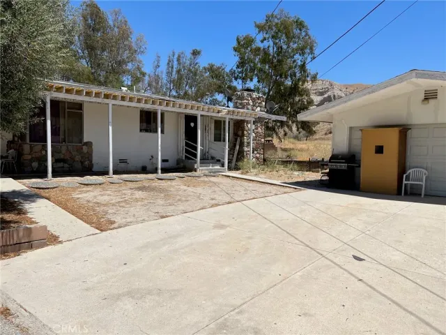 a view of a house with a patio