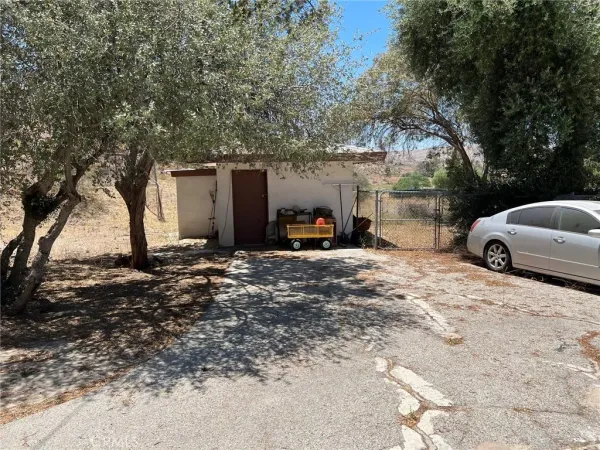 a view of a car parked in front of house
