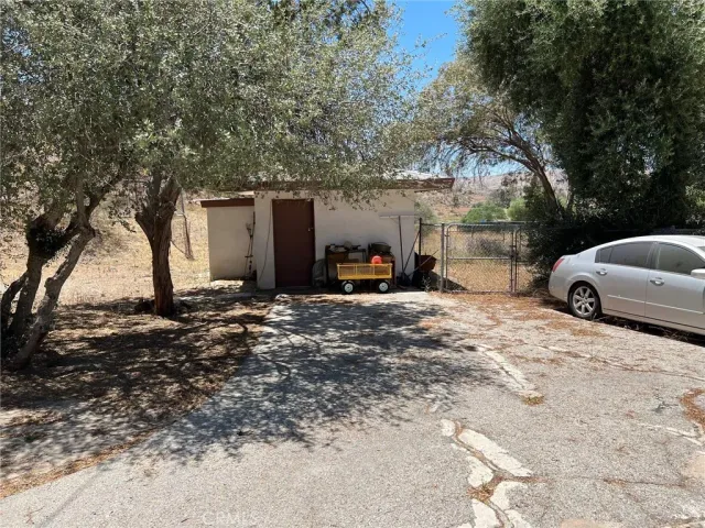 a view of a car parked in front of house