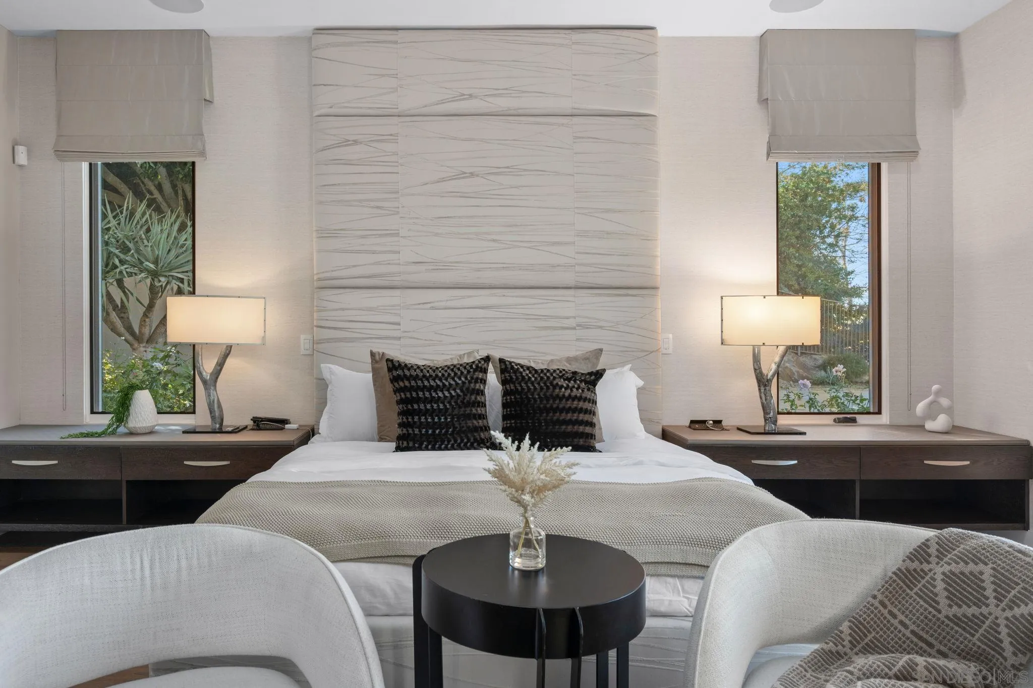 6968 St Andrews Road Rancho Santa Fe, CA 92067 - Photo 17 of 23 a bedroom with a bed and a table