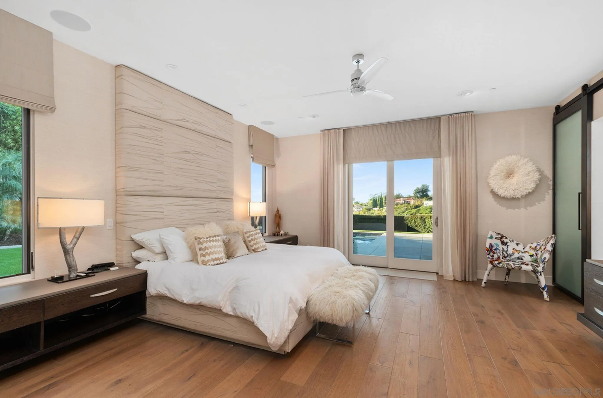 6968 St Andrews Road Rancho Santa Fe, CA 92067 - Photo 18 of 23 a bedroom with a bed and a couch