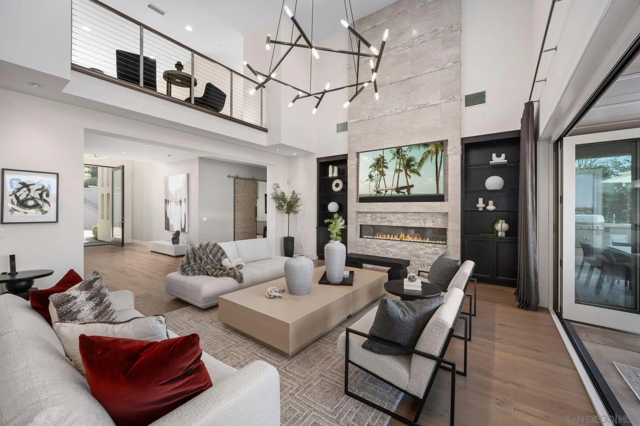 6968 St Andrews Road Rancho Santa Fe, CA 92067 - Photo 5 of 23 a living room with furniture and wooden floor