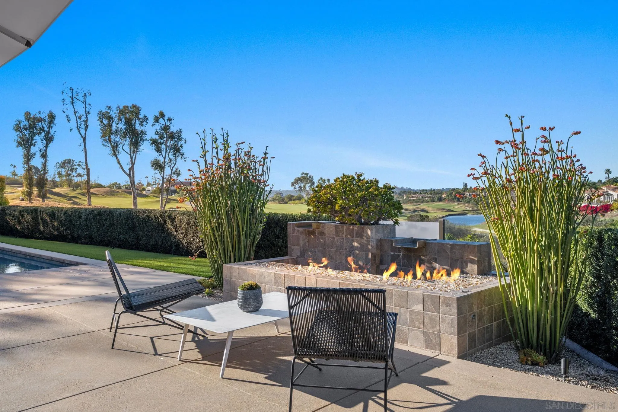 6968 St Andrews Road Rancho Santa Fe, CA 92067 - Photo 10 of 23 a view of a chairs and tables in the patio