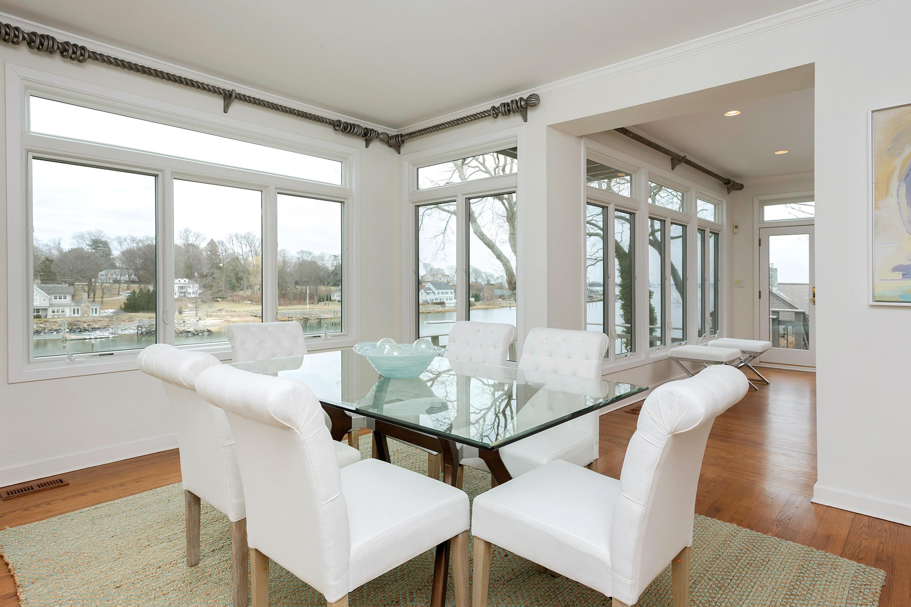 17 Thomas Place Rowayton, CT 06853 - Photo 11 of 37 a living room with furniture and a large window
