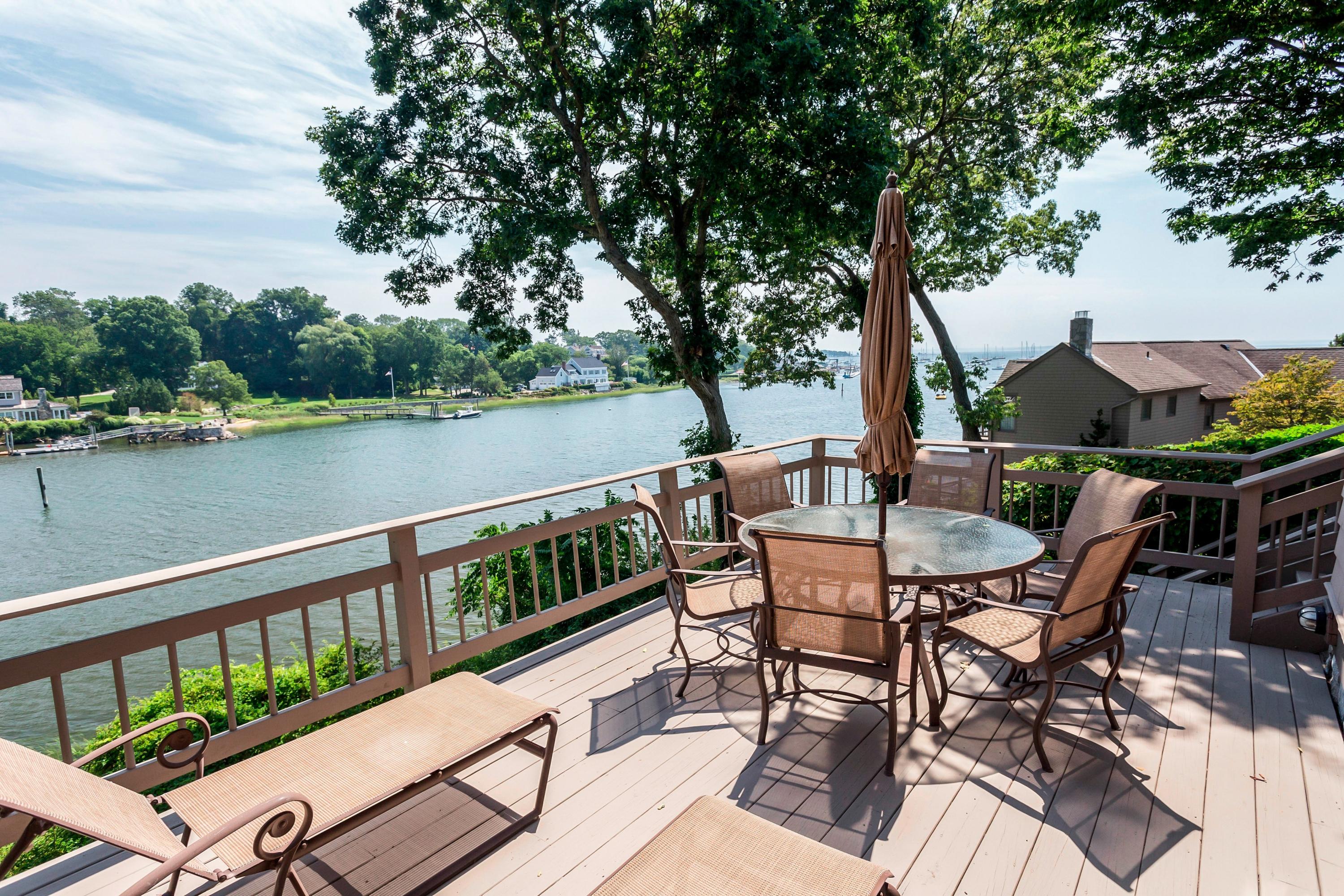 17 Thomas Place Rowayton, CT 06853 - Photo 12 of 37 a view of a balcony with two chairs and a table