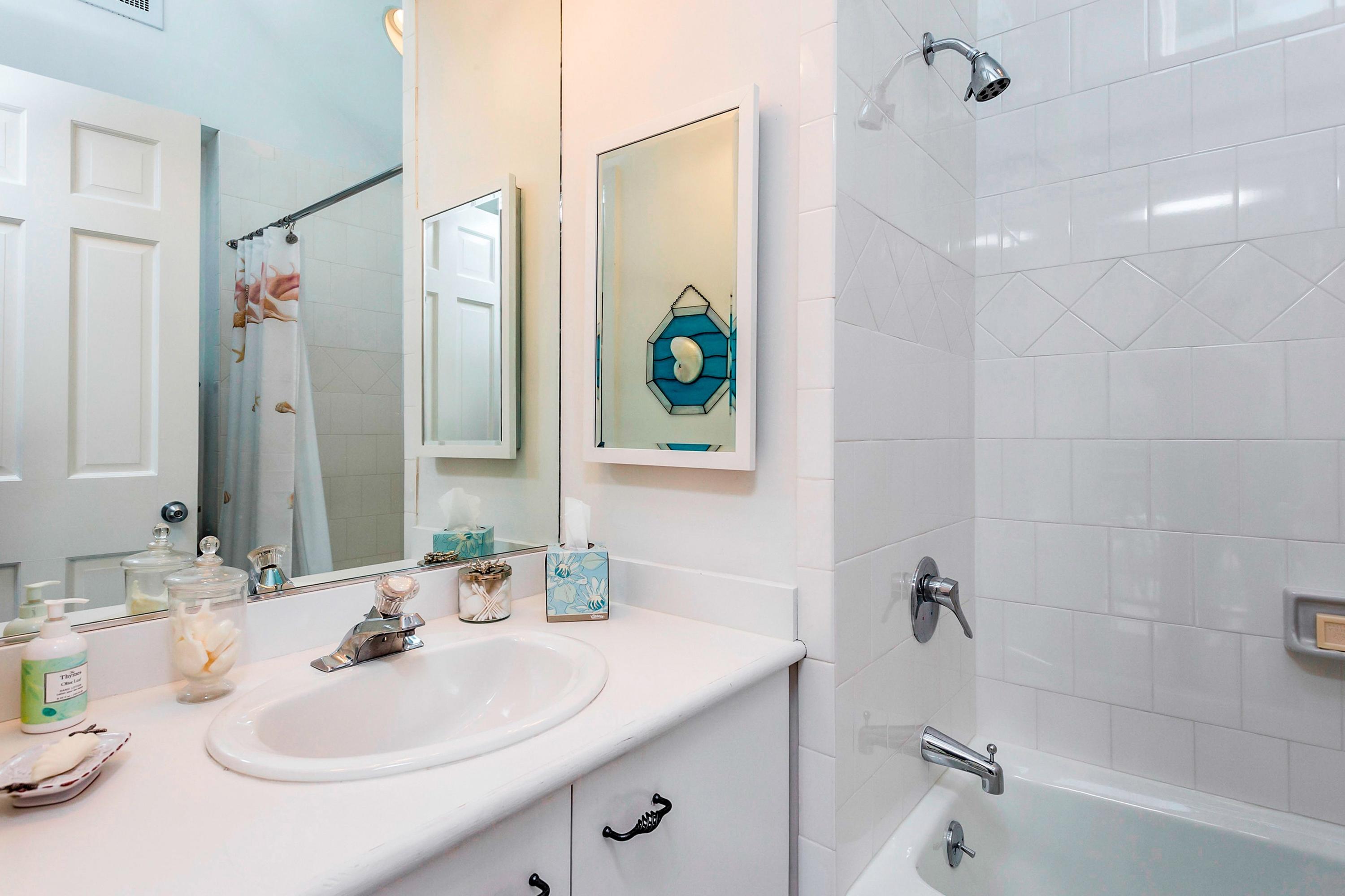 17 Thomas Place Rowayton, CT 06853 - Photo 21 of 37 a bathroom with a sink and a mirror